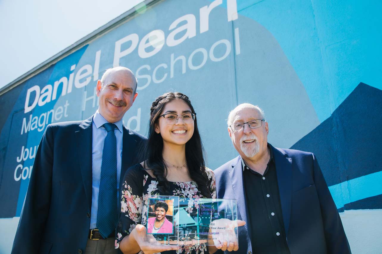 Valeria with NLP founder Alan Miller (left) and board member Walt Mossberg (right).