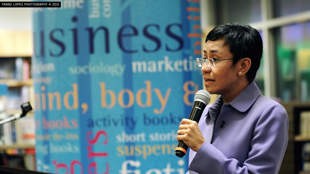 image of maria ressa speaking at an event
