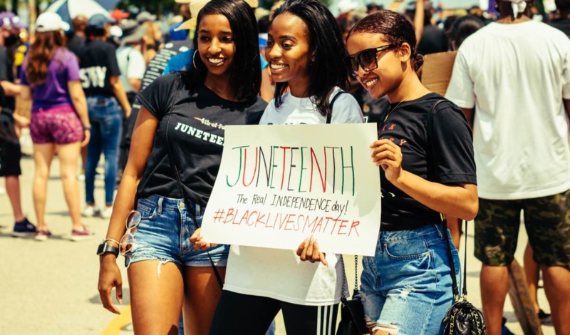 Juneteenth Rally. Local faith leaders, city leaders and citizens meet downtown to celebrate the anniversary of Juneteenth and the Black Lives Matter movement in Grant Park, Chicago on June 19, 2020.
