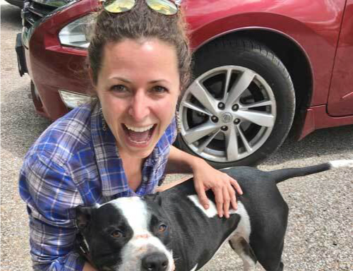 niki lessig pictured outside with her dog emmi