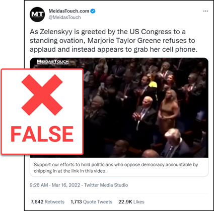A tweet from MeidasTouch.com that says “As Zelenskyy is greeted by the US Congress to a standing ovation, Marjorie Taylor Greene refuses to applaud and instead appears to grab her cell phone.” The News Literacy Project has added a label that says, 'FALSE.'
