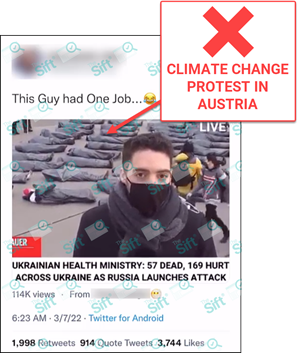 A tweet that says “This guy had one job” with a video that shows a television news journalist who appears to be reporting on casualties in Ukraine, with what looks like rows of body bags in the background. The video appears to have a caption that reads “Ukrainian health ministry: 57 dead, 169 hurt across Ukraine as Russia launches attack.” During the clip, one person under a tarp can be seen moving. The News Literacy Project has added a label that says 'CLIMATE CHANGE PROTEST IN AUSTRIA.'