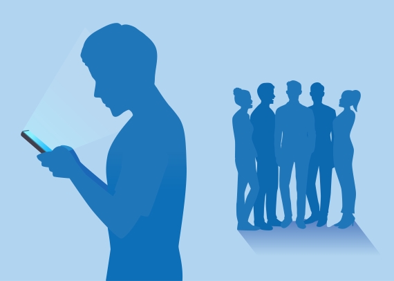 A blue illustration of a person looking down at a glowing smartphone and isolated from a group of five people standing and socializing with one another.