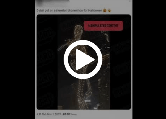 A screenshot of a video posted on X says “Dubai put on a skeleton drone show for Halloween” attached to a video of a supposed drone skeleton walking at night. The News Literacy Project has added a play button and a “manipulated content” label over the post.
