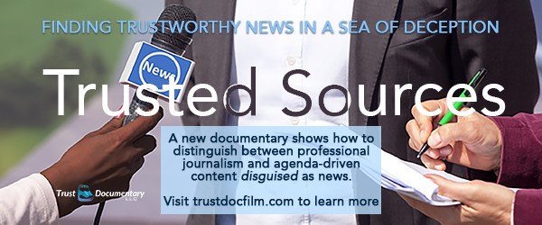 A banner ad for the documentary film Trusted Sources with a close-up image of someone in a suit beside two news reporters. One reporter’s hand holds a news microphone and the other reporter’s hand is taking notes with a pen and paper. Descriptive text says: “Finding trustworthy news in a sea of deception” and “A new documentary shows how to distinguish between professional journalism and agenda-driven content disguised as news.” The ad includes a link to trustdocfilm.com for viewers to learn more. 