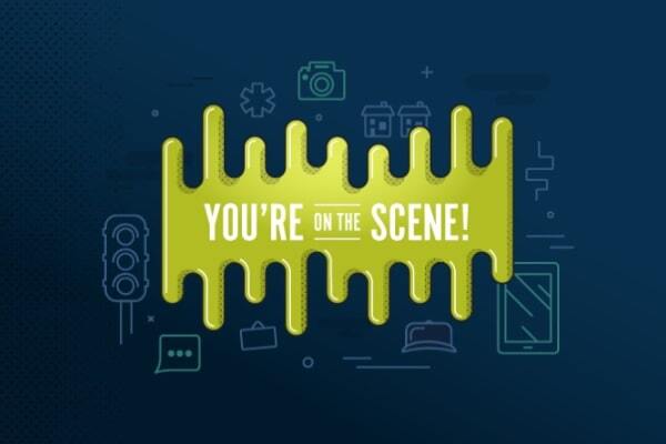 The words “You’re on the scene!” are placed over green slime with a dark background that has icons of images such as a street sign, a camera, an asterisk, houses and a quote bubble.