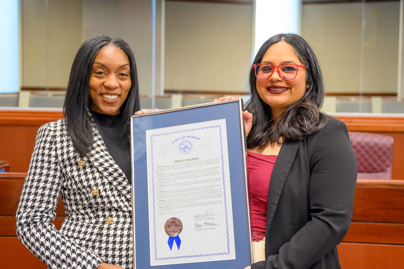 Ebonee Rice, NLP's Senior Vice President of Educator Engagement, left, joins Nevada state lawmaker Cecelia González in announcing a proclamation supporting National News Literacy Week in Carson City on Feb. 4.