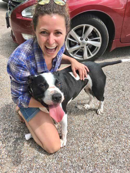 niki lessig pictured outside with her dog emmi