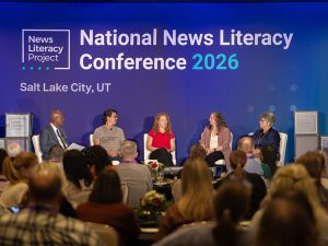 Journalist Pierre Thomas leading a panel discussion.